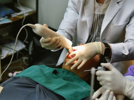 Dental patient having digital impressions of their teeth taken