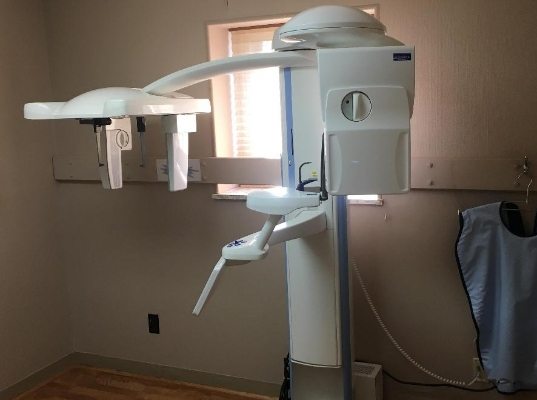 Dental scanner against the wall
